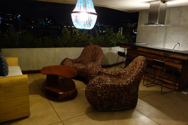 Charlee Hotel - our patio with grill and cool furniture.