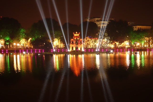 West Lake in the center of Hanoi all a glow for the Tet New Year celebration. 